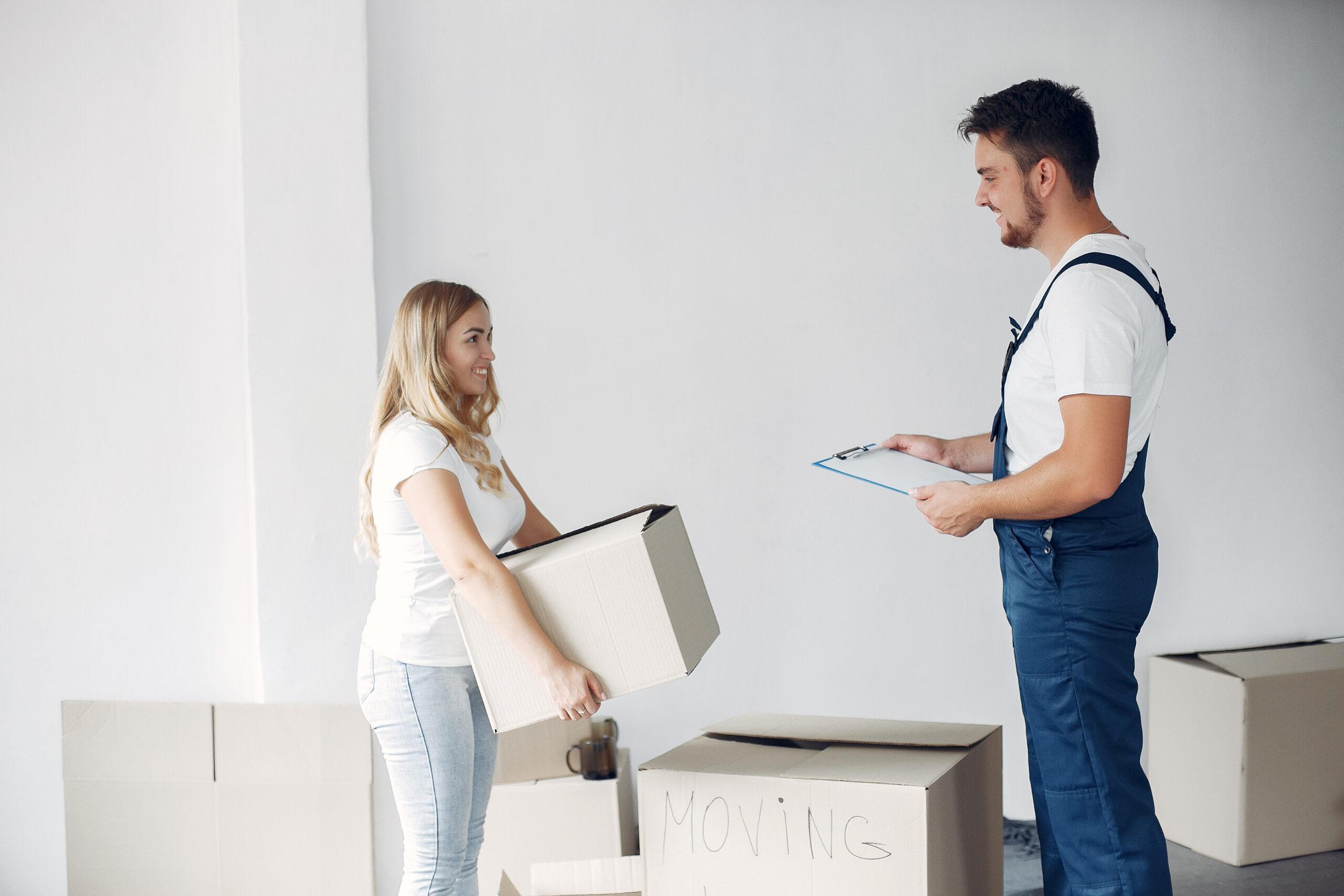 Homeowner preparing moving boxes while planning a move